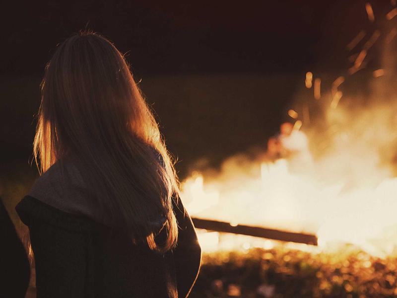 Evening gathering by firelight